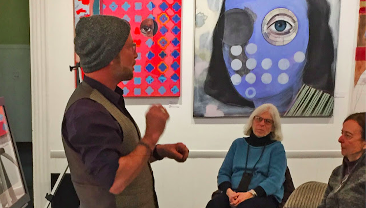 David Lee Black discusses his work at the February 2018 Feedback Forum, while Brenda Steinberg and Edwina Rissland listen intently